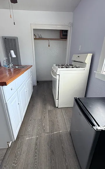 storage area , range/oven and refrigerator