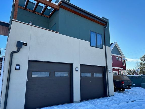 Carriage house above garage