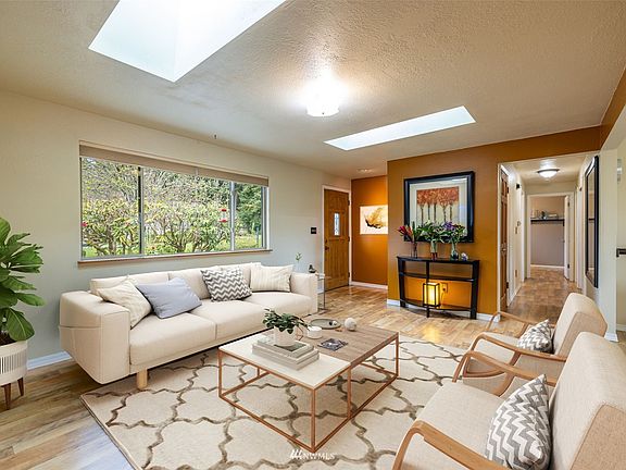 Living area has been virtually staged.