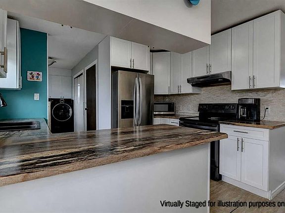4th image of 5323 N Sunset Dr