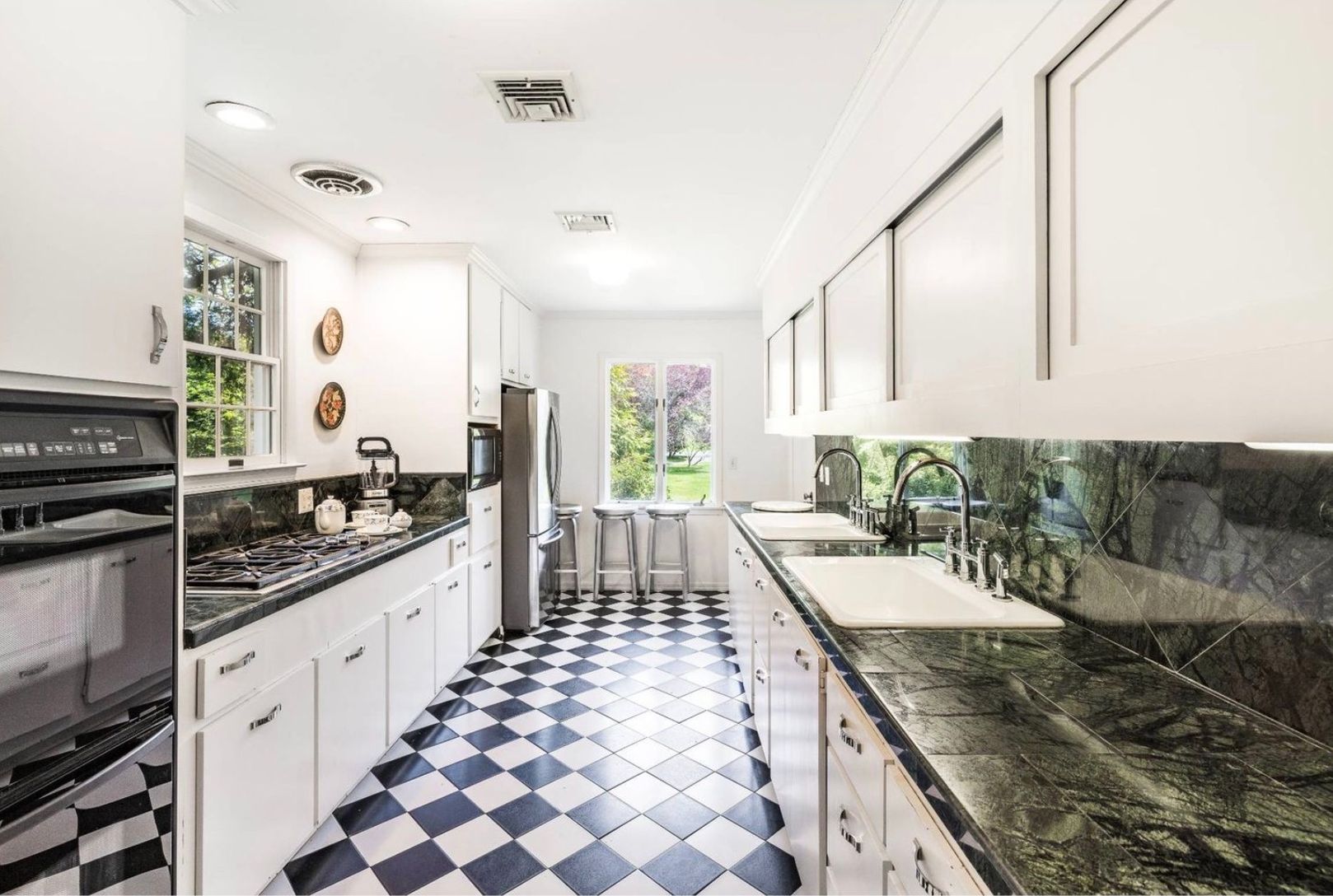  kitchen, just off of the living room, can close doors for privacy as necessary, facing front yard
