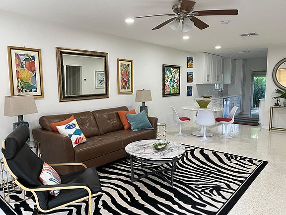 Family room with polished terrazzo floors 
402 Venetian