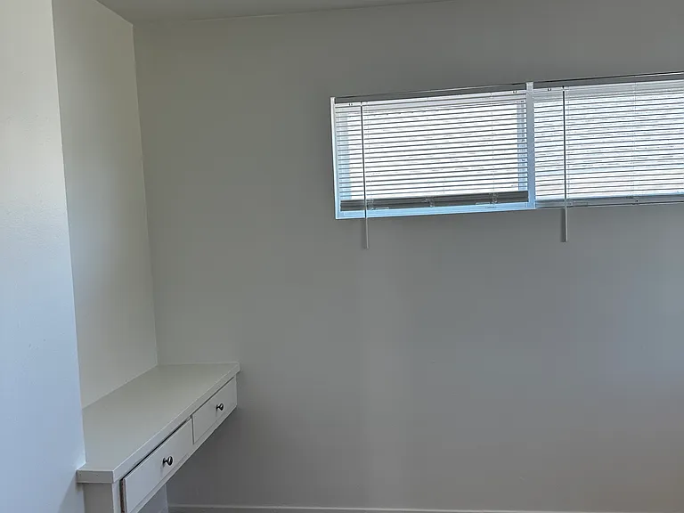 bedroom with walk in closet