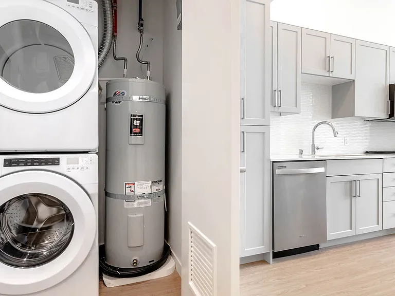 Kitchen with Stainless Steel Appliances and In-home Washer and Dryer