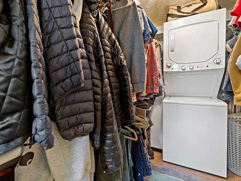 Large walk-in closet with plenty of rooms for 2 peoples' clothes, shoes, tools, storage etc.
