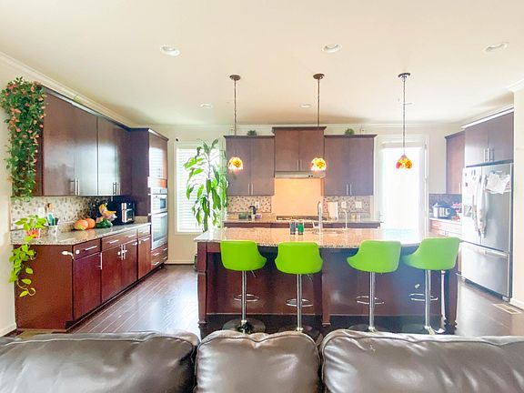 Wide Kitchen View with Plenty of Storage space from Family Room