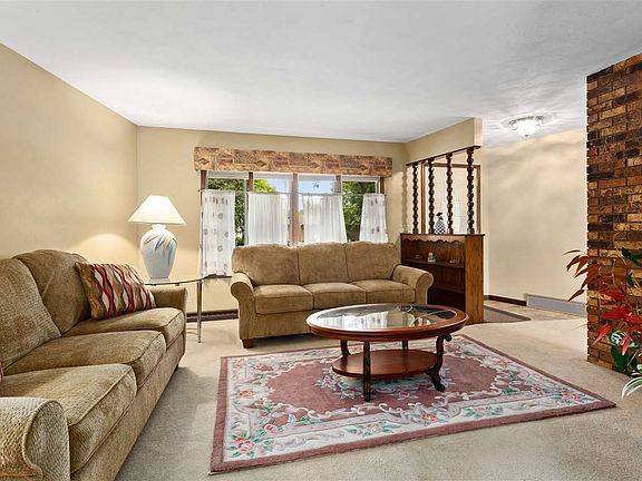 LIVING ROOM WITH BAY WINDOW