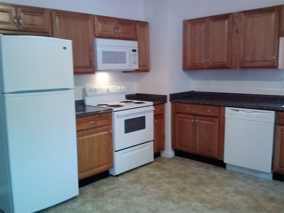New kitchen with new stove, refrigerator, dishwasher and abo