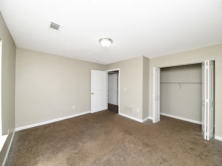 Bedroom with over and attached closet