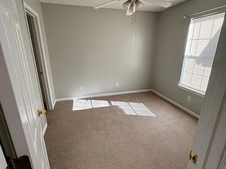 Front Guest Bedroom with walk in closet and private entrance to Main Bathroom