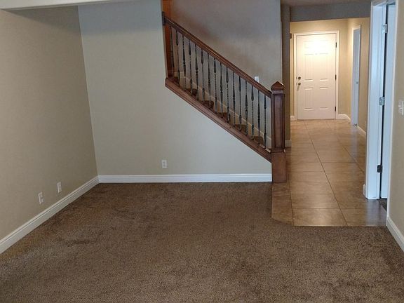 Living area looking back at the front door and entrance