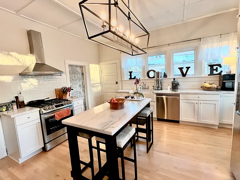 kitchen with island and four seats