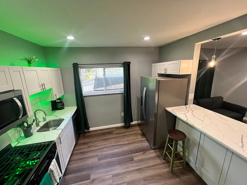 Kitchen - over/under cabinet lighting can be changed to any color or white