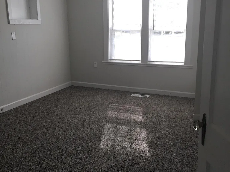 Bonus Room off the kitchen on the right with access to a one car garage.