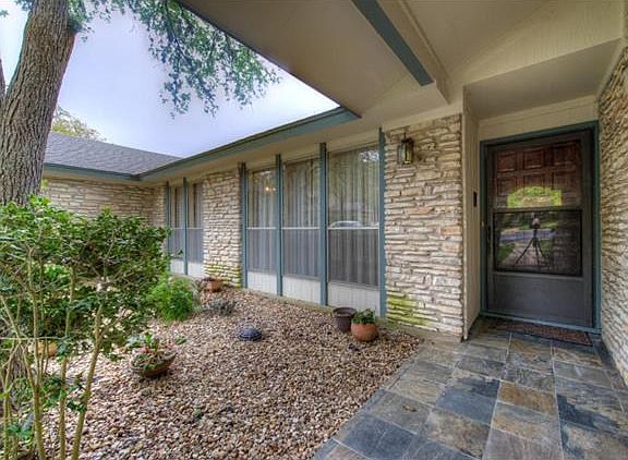 Front courtyard with french drain.