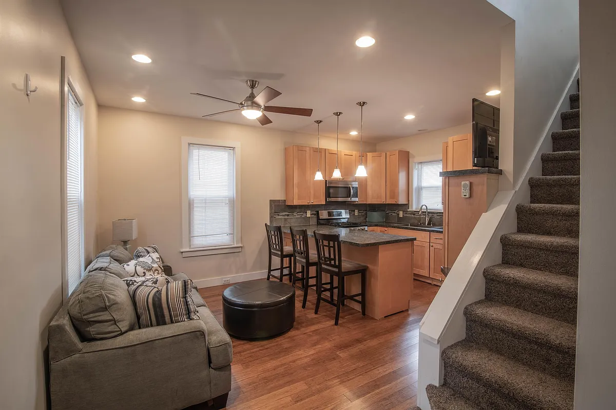 Open kitchen with microwave, dishwasher, five burner stove. - 517 6th Ave