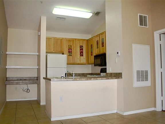 5th image of 10029 Courtney Palms Blvd APT 202