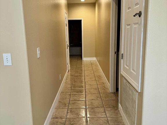 Hallway to 2 bedrooms and 1 full bath