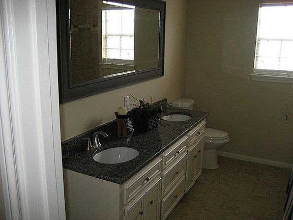 Granite and Custom features in Guest Bath.