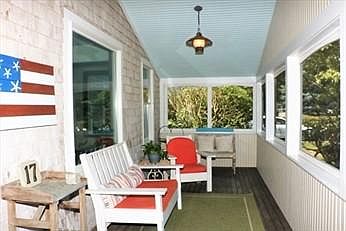 Screened porch facing East.