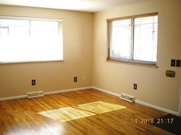 Sunny living room with newly polished wood floors