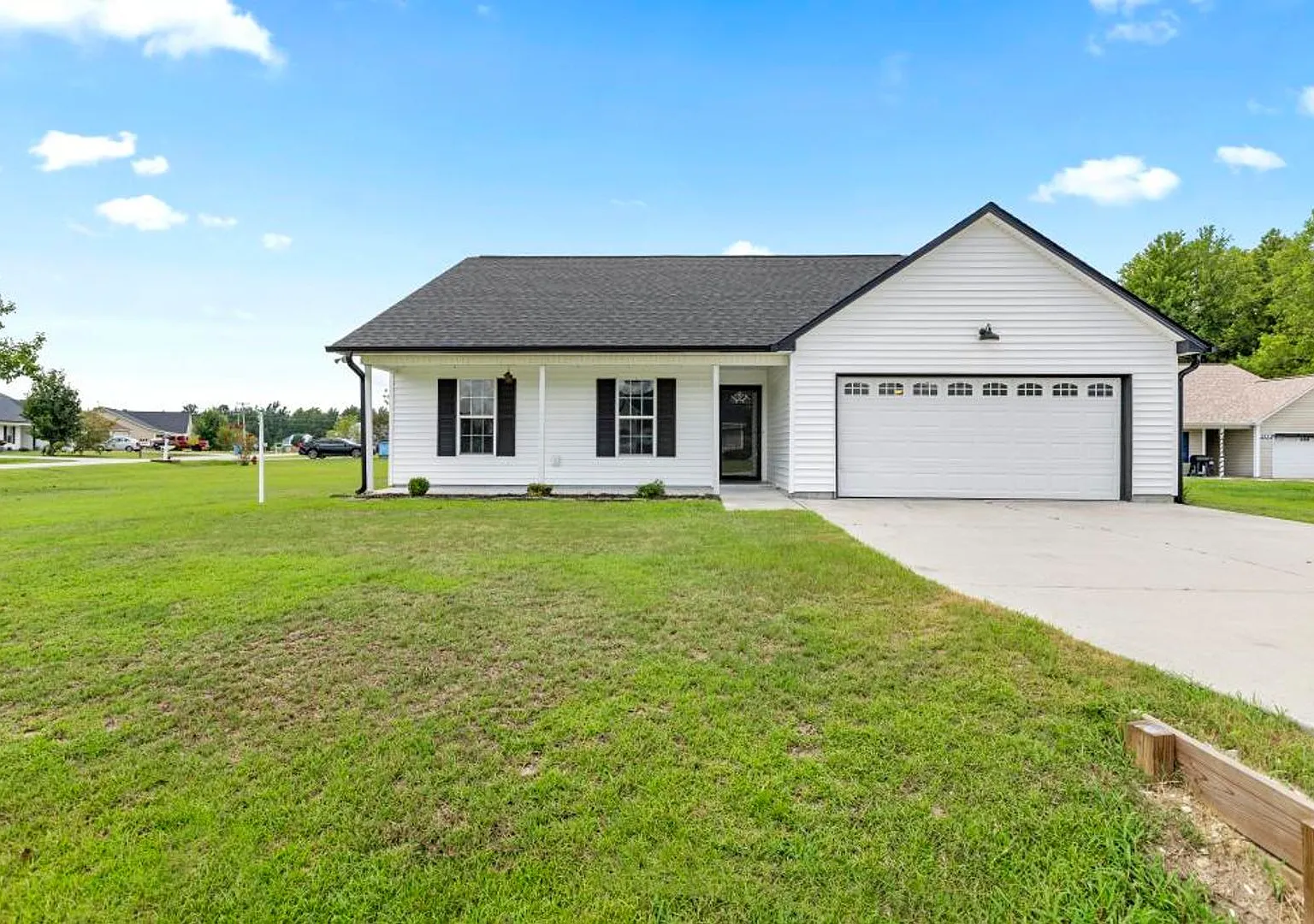 Corner-Lot Gem with Bonus Garage Space & Entertainer's Backyard! — Photo 2