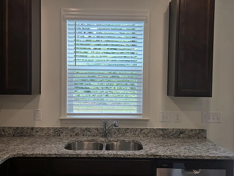 Stainless steel sink with a view and light from the window