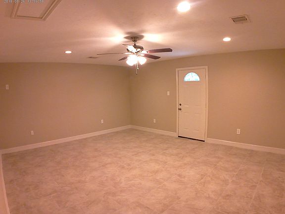 Extra Room w/Tile, LOTS of Light and Ceiling Fan!