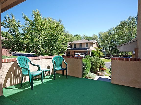 Sunny front patio for flowers and visiting