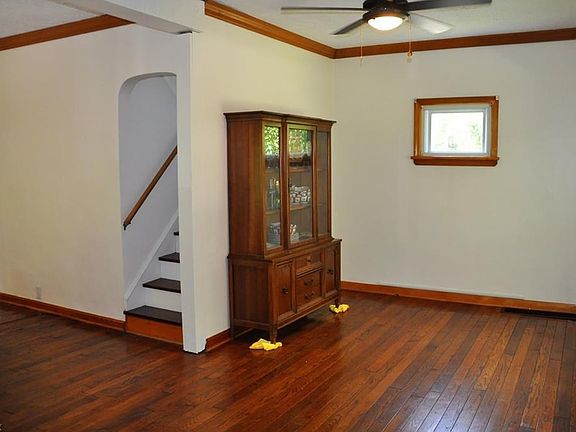 Beautiful Hardwood Floors continue from the Living Room into the open Dining Room.