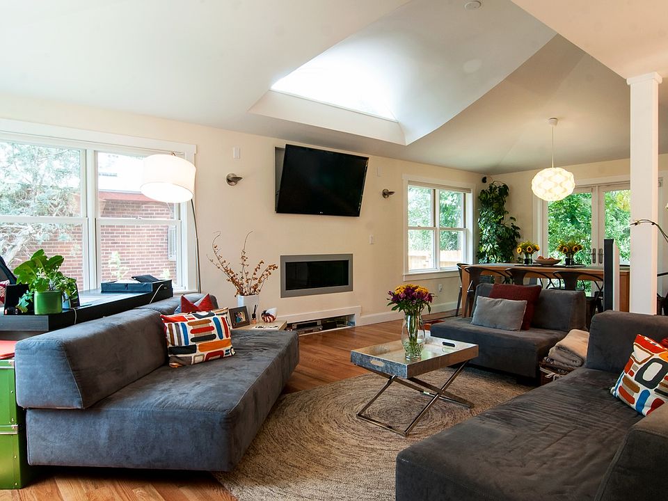 Living room with barrel vault window