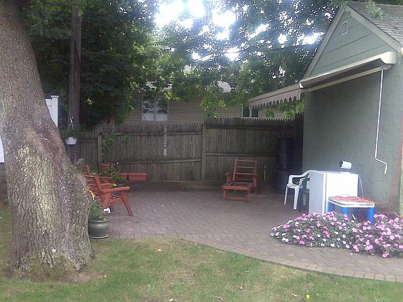 brick walk way to back yard