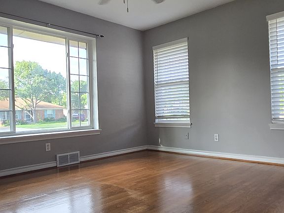 Lovely Front Bedroom, maybe my favorite room in the house, and I'm not sure except that I love the natural light and the picture window in this room. :)