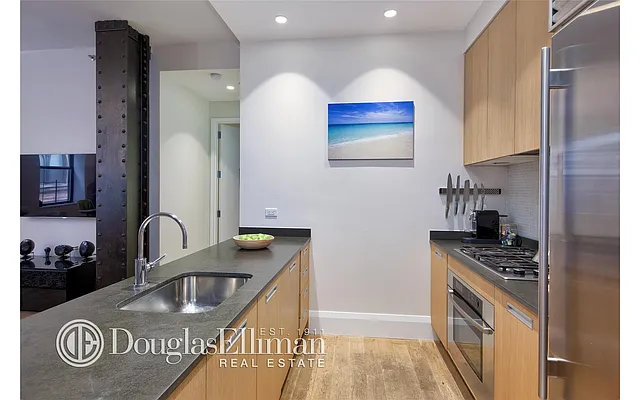 Sold by Douglas Elliman | media 13