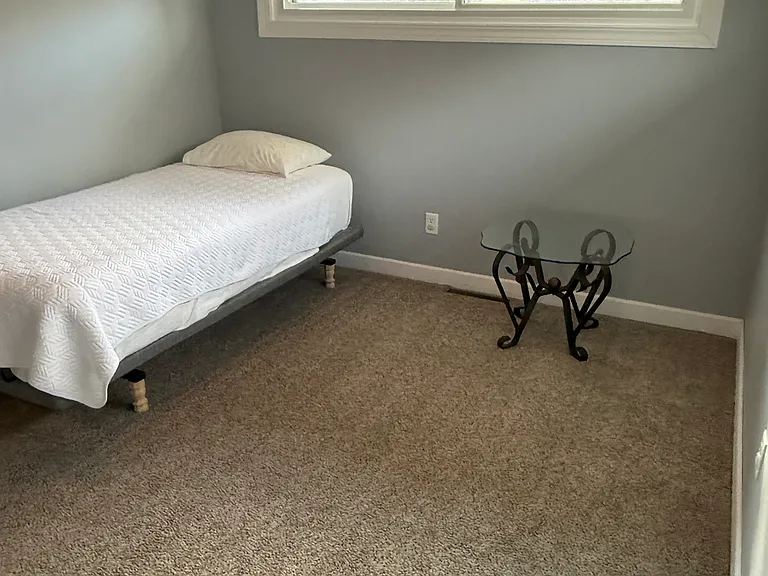 Twin bed with remote adjustable bed