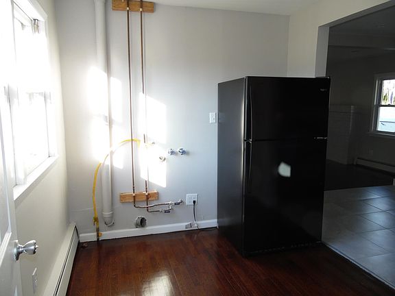 Laundry room includes washer and dryer.