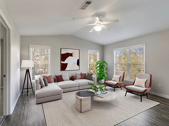 Spacious living room with natural light and flexible layout
