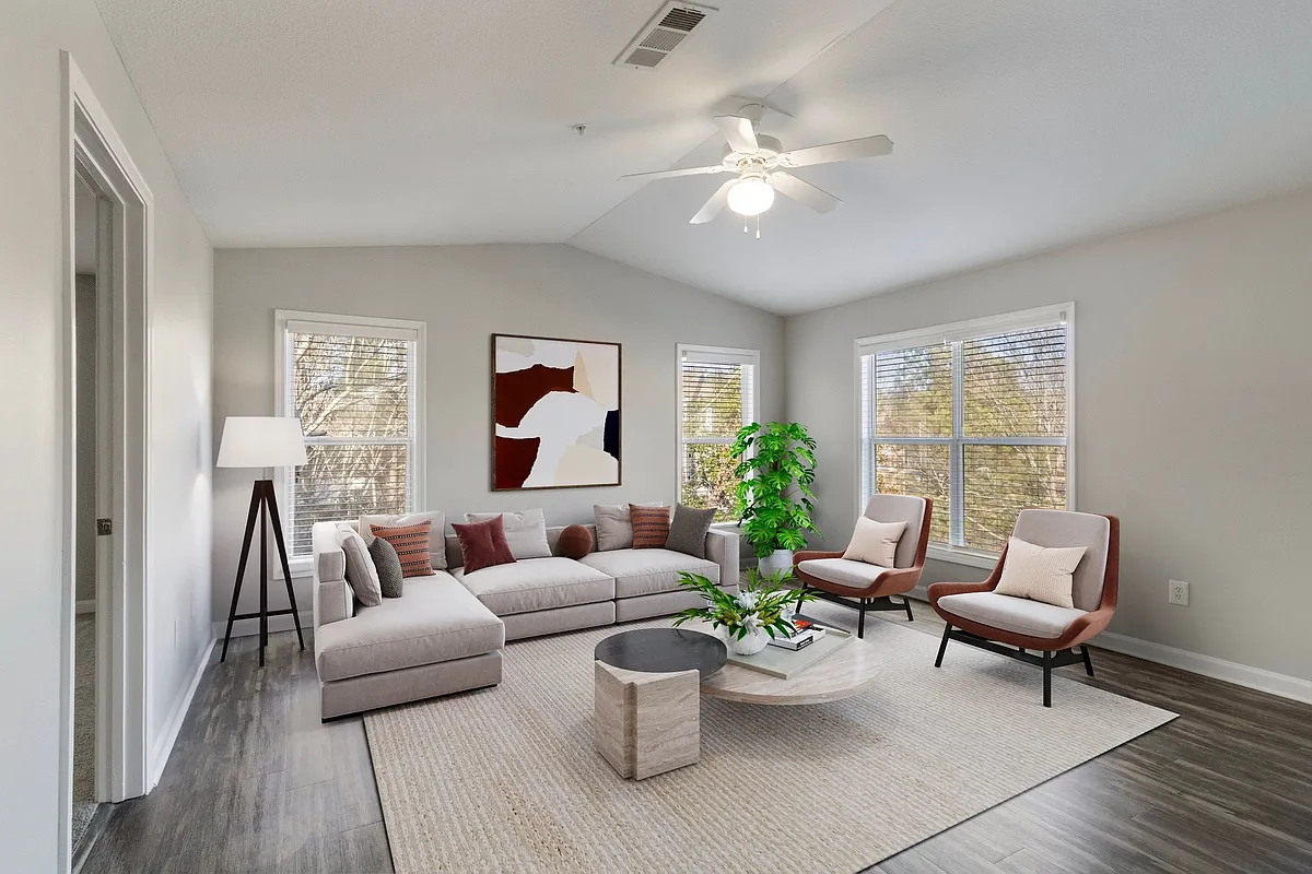 Spacious renovated living room with natural light and flexible layout - Windsor Kennesaw