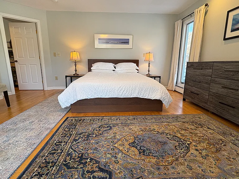 Large bedroom! Comfortable queen sized bed with brand new mattress (Jan 2025), and new linens.