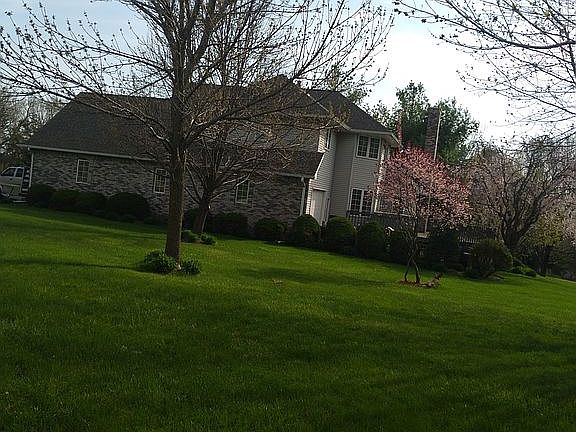 large yard mature trees