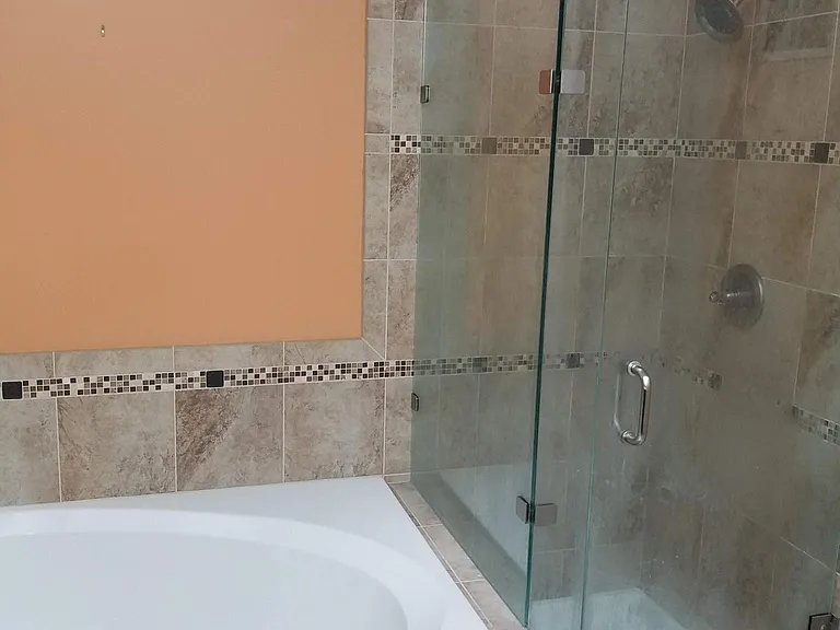 Master Bathroom with soaking tub and stand up shower.