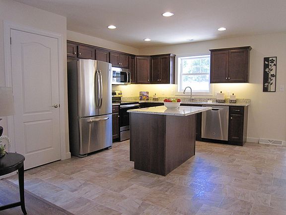 Kitchen. Photo from similar home.