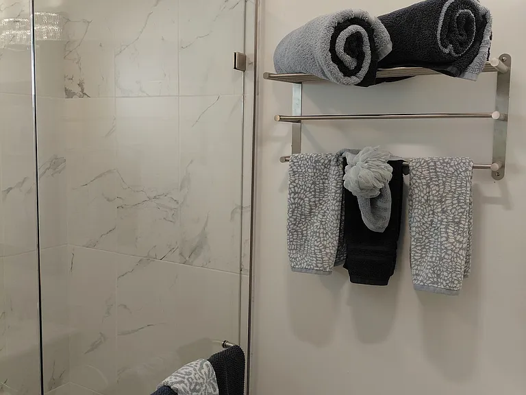Bathroom with Shower, Custom Tile and Brushed Nickel Finishes