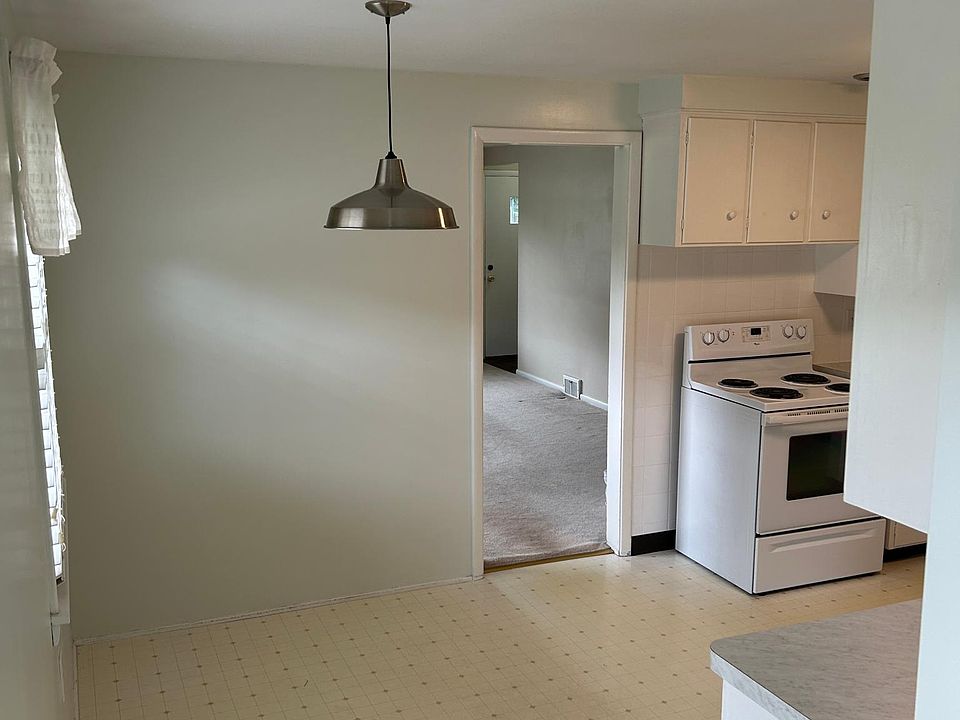 Room for eating area and pocket door separates the living spaces.
