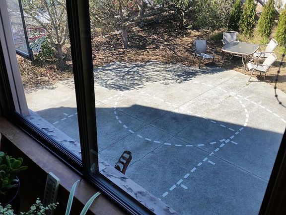 Side Yard patio/Basketball Court