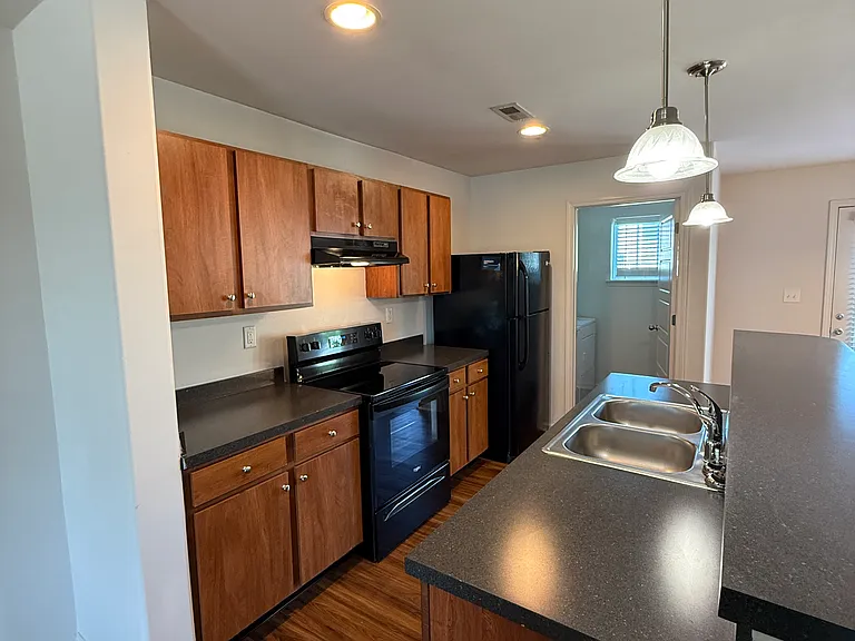 Photos of layout in similar unit. Overall finishes and fixtures may vary by home