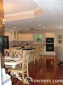 Cherry floors, Maple cabinets