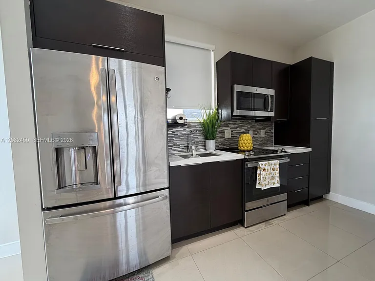 6440 NW 103rd Psge #6440 — Photo 1