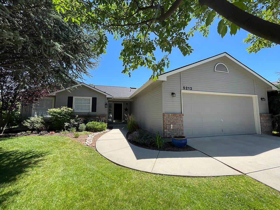 Mature landscaping and walking path to front door