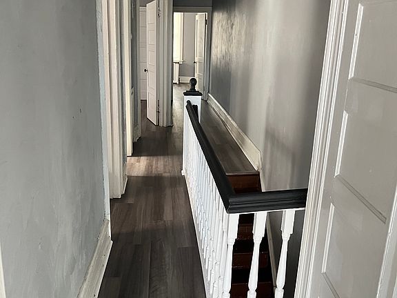 Hallway view from Family room to length of apartment.